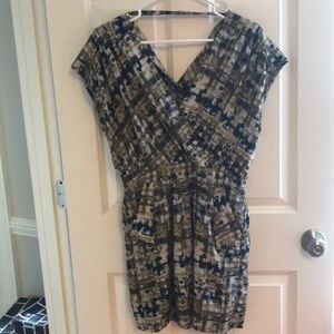 Dress with drop back. Short, pockets